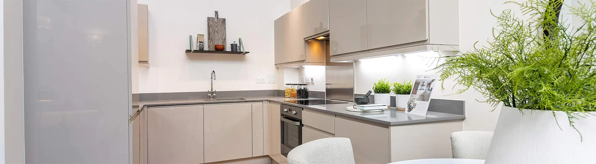 Beaumont Gardens Grey Kitchen with complimentary grey worktop by Roann Ltd.