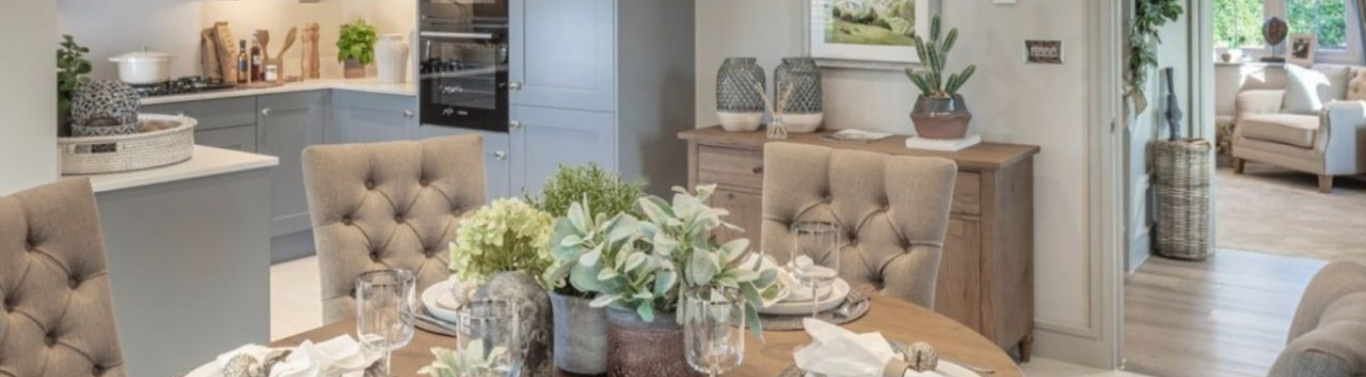 Berkeley Group - Open living spacer with dining table and mid grey kitchen