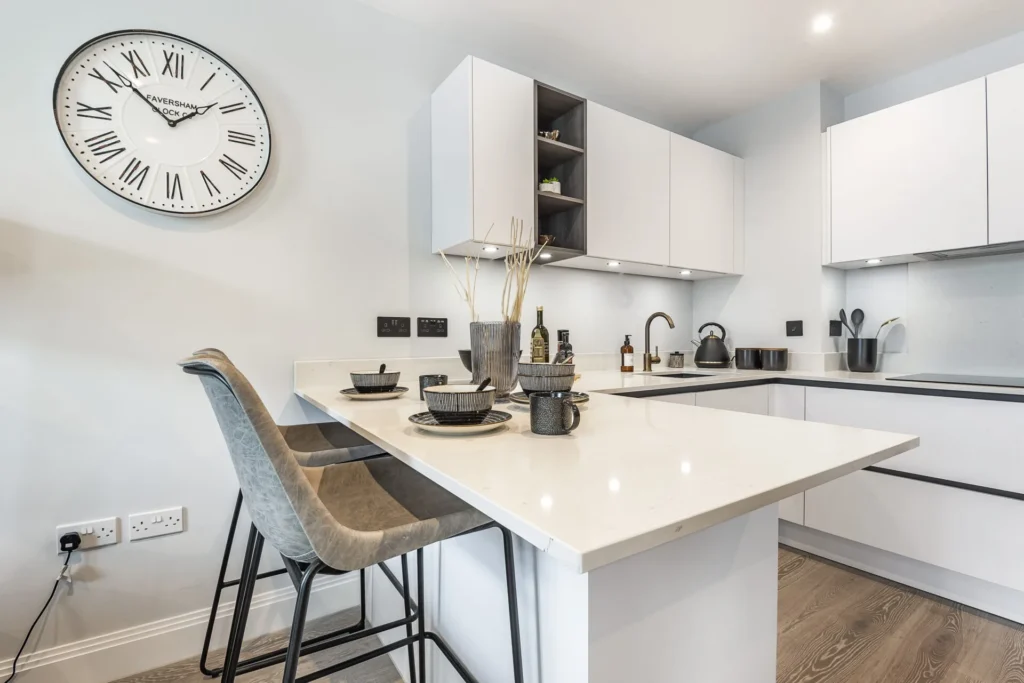 The Pure Lake Group - Modern white gloss kitchen with matching worktop